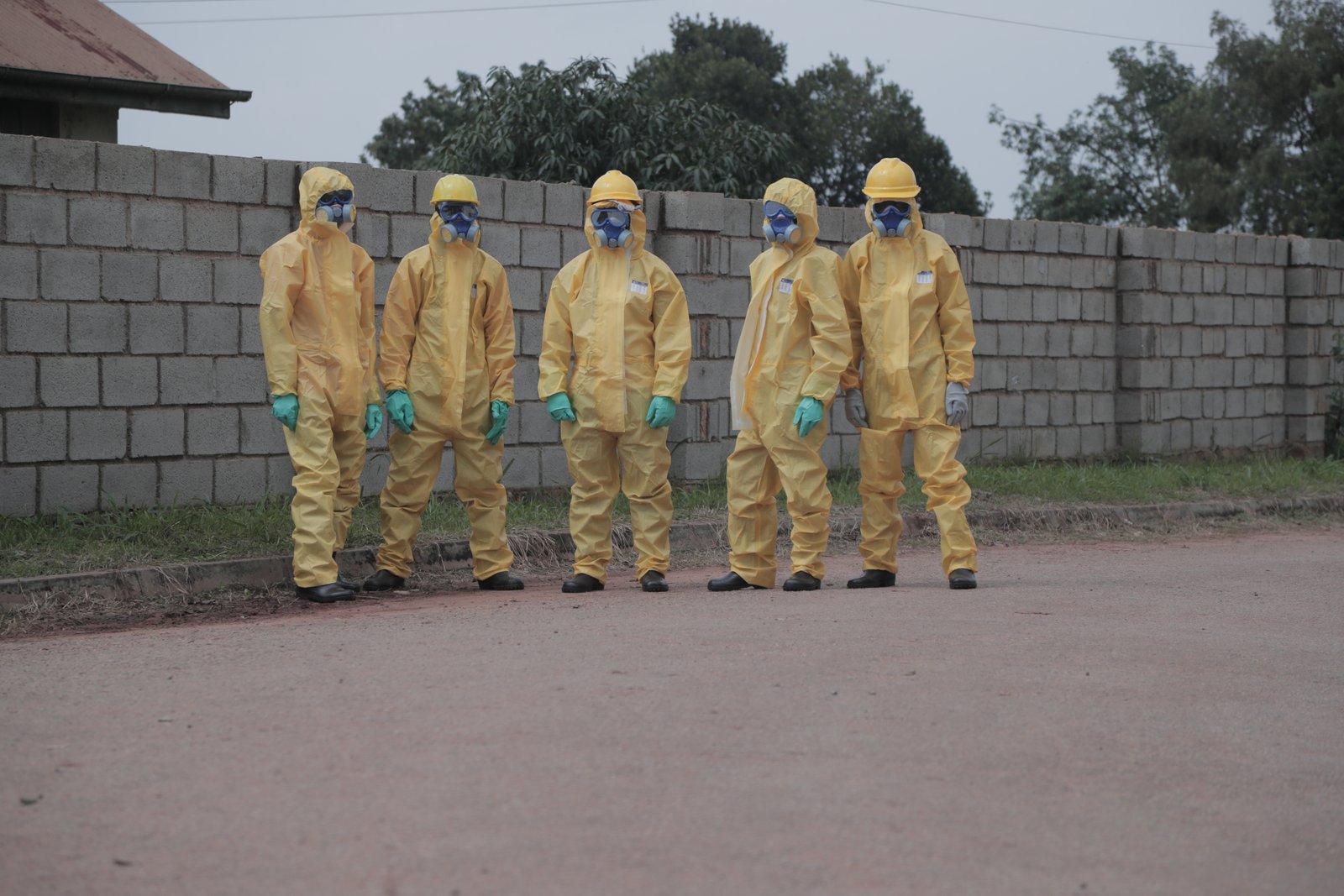 De Waste hazmat team in full protective equipment